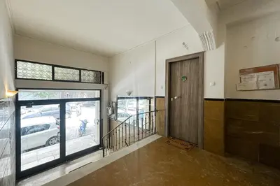 an empty room with a door and a window at My Athens Home near Metro Station in Athens