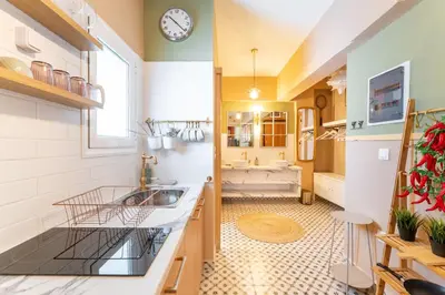 a large kitchen with a sink and a bathroom at Chilli & Chill in Athens