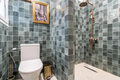 a bathroom with a toilet and a shower at Chilli & Chill in Athens