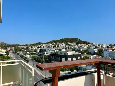 a view of a city from a balcony at Panoramic Penthouse in Athens