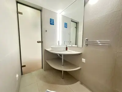 a bathroom with a sink and a mirror at Athens 5th Floor Retreat, Blissful Escape in Athens