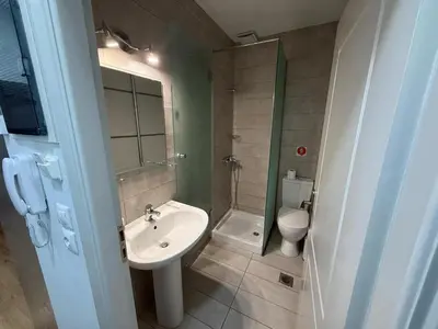 a bathroom with a sink and a toilet at Στούντιο στο Κέντρο της Πόλης in Athens