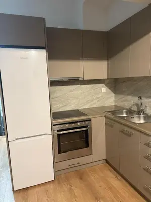 a kitchen with a white refrigerator and a sink at Στούντιο στο Κέντρο της Πόλης in Athens