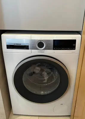 a white washing machine with its door open at Etherion Luxury Rooftop Balcony Penthouse in Athens in Athens