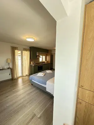 a bedroom with a bed in a room at Rooftop in Psyrri- 360 Athens view in Athens