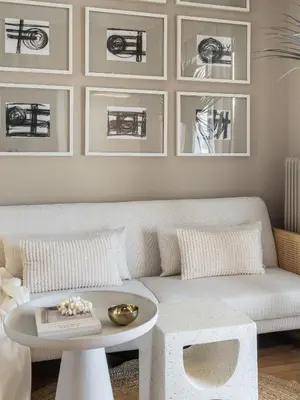 a living room with a couch and a table at Pause In Athens in Athens