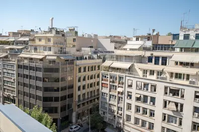 an overhead view of a city with tall buildings at Athens Central Skyline Studio by ΜΡS in Athens