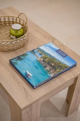 a book sitting on top of a table at Kynos Athens Studio in Athens