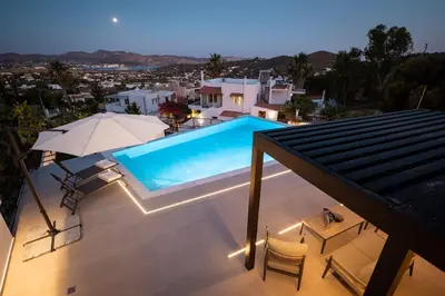 a swimming pool on the roof of a house at Nicolas Villa in Anavissos