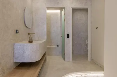a bathroom with a sink and a bath tub at Thissio Acropolis Retreat in Athens