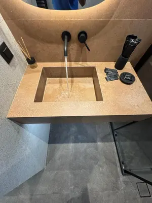 a sink in a counter with a water fountain at Escape Suites - Sea View in Porto Rafti
