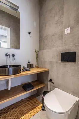 a bathroom with a white toilet and a sink at Luxurius Studio Near Plaka & Acropolis 1 in Athens