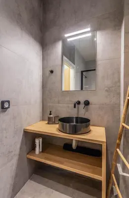 a bathroom with a sink and a mirror at Luxurius Studio Near Plaka & Acropolis 1 in Athens