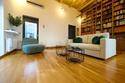a living room with a couch and a chair at Ma Maison No9 Downtown Villa,Jacuzzi,5bdrs,Parking in Athens