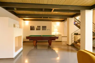 a pool table in the middle of a room at Ma Maison No9 Downtown Villa,Jacuzzi,5bdrs,Parking in Athens