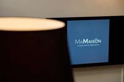 a television with a blue screen in a room at Ma Maison No9 Downtown Villa,Jacuzzi,5bdrs,Parking in Athens