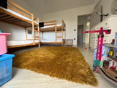 a room with two bunk beds and a pile of hay at Seaview Haven in Sounio