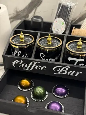 a box full of coffee cups and a coffee bar at S&P-elegant suite with jacuzzi in Athens