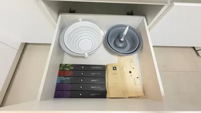 a box with a fan and other items in it at Filellinon in Athens