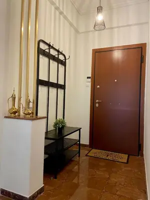 a room with a door and a table and a table sidx sidx at Kypseli Modern Nest in Athens