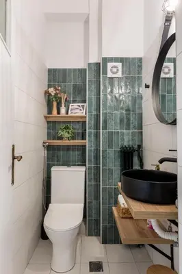 a bathroom with a toilet and a sink and a tub at Eleni's Terrace in Ampelokipi in Athens