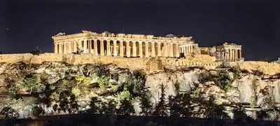 a building on the side of a mountain at Syntagma Acropolis M5 in Athens