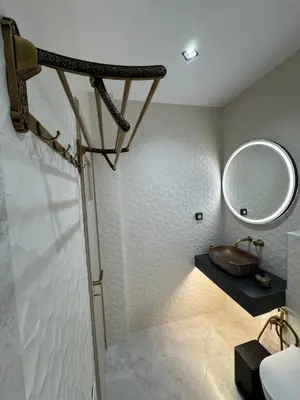 a bathroom with a sink and a mirror at Cozy vintage flat in Athens