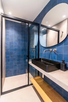 a bathroom with a black sink and a mirror at A43 Renovated in 2025 Great base for Koukaki in Athens