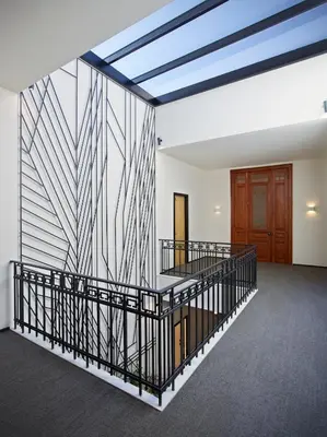 a room with a black and white striped wall at InnAthens in Athens