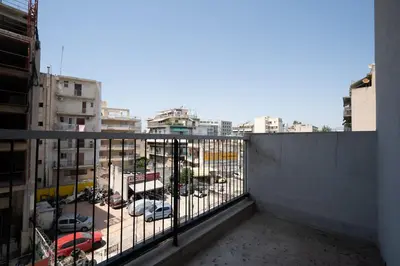 a balcony with a view of a parking lot at Beba's House by ΜΡS in Athens