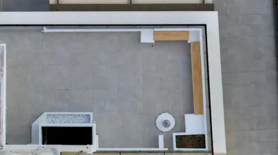 a brick wall with an open door of a building at Luxury Penthouse 360 Acropolis and Athens Views in Athens