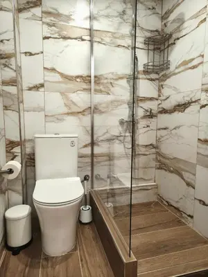 a bathroom with a toilet and a shower at Studio Σταθμός Λαρίσης 100Mbps , Μπαλκόνι in Athens