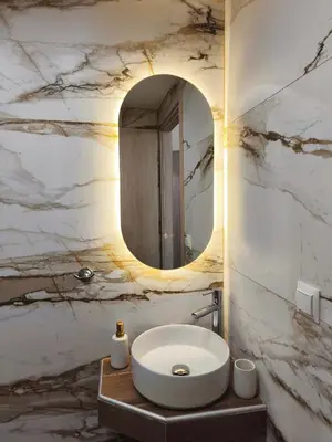 a bathroom with a white sink and a mirror at Studio Σταθμός Λαρίσης 100Mbps , Μπαλκόνι in Athens