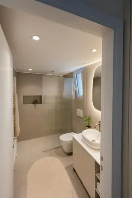 a bathroom with a toilet and a sink at Luxury 2bedroom Apartment in Glyfada- Scarlet Vibes Glyfada in Athens