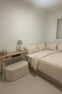 two beds in a room with a table and a desk at Luxury 2bedroom Apartment in Glyfada- Scarlet Vibes Glyfada in Athens