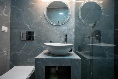 a bathroom with a sink and a mirror at Lilac Dream in Glyfada by ΜΡS in Athens