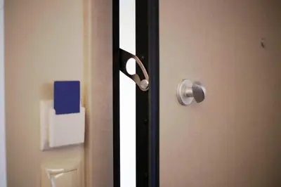 a close up of a door with a handle at The Brightline Apartment Athens in Athens