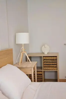a bedroom with a bed and a desk with a lamp at Acropolis Luxury retreat in Athens
