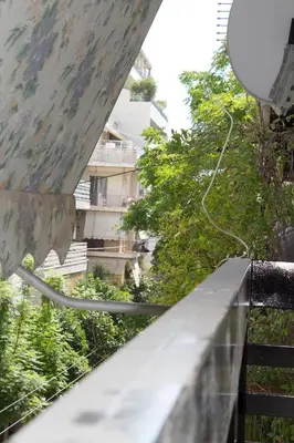 a wire is attached to the side of a fence at Acropolis Luxury retreat in Athens