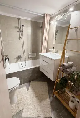 a bathroom with a sink and a shower and a toilet at Dream House in Athens