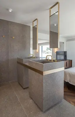 a bathroom with two sinks and a bed at Luxury Loft Sauna HotTub Psyhiko in Athens