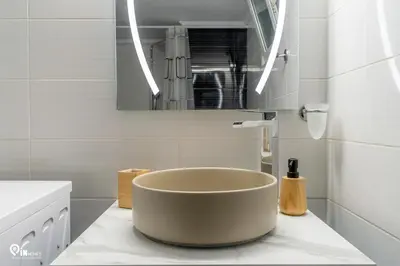 a bathroom with a large tub on a counter at Danae's - Luxury & Modern Apartment in Egaleo-Athens in Athens