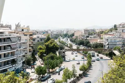 an aerial view of a city street with cars at City Chic Living-3BR Kallirrois in Athens