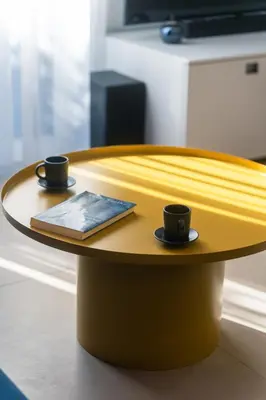 two cups of coffee sitting on a round table at Casa Aura-Artistic Living Faliro in Athens