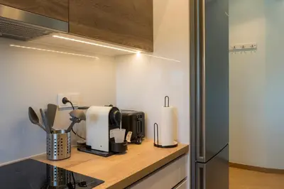 a kitchen with a counter with appliances on it at Highway Haven - Halandri in Athens