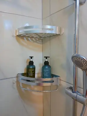a bathroom with two bottles of soap on a mirror at Mountain Haven - Japandi Style With 100Mbps Wi-Fi in Athens