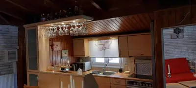 a kitchen with a sink and a stove top oven at Rooftop bliss in Athens