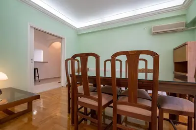 a dining room with a table and chairs at Metaxourgeio Metro Apartment-Comfort for 3 by ΜΡS in Athens