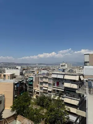 a view of a city with buildings at Beautiful apartment in Petralona in Mesochórion
