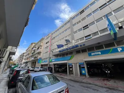 a car parked in front of a hotel at MetroSide & Concert Hall Studio by ΜΡS in Athens